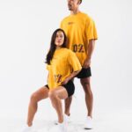 klær T442183 gull gul htx t-skjorte unisex Alphalete